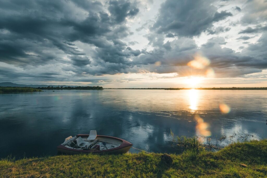 sun is coming up over zambezi river
